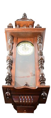 Lot 99 - A Vienna wall clock in a mahogany case, with...