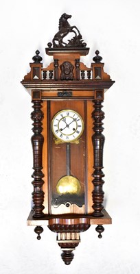 Lot 97 - A Vienna mahogany wall clock, the pediment...