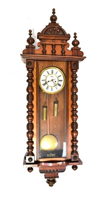 Lot 98 - A Vienna mahogany cased wall clock with arched...