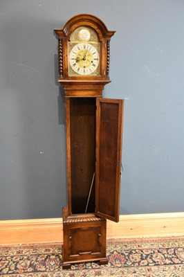 Lot 6452 - A 1950s oak cased grandmother clock, the...