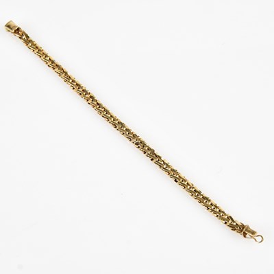 Lot 523 - A 9ct yellow gold bracelet, length 18cm,...