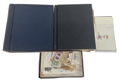 Lot 496 - Two all world stamp albums and a tin of loose...