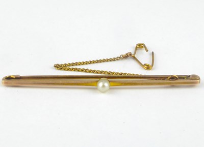 Lot 1081 - A 15ct gold bar brooch with single seed pearl...