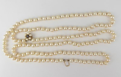 Lot 1112 - A double-string cultured pearl necklace united...