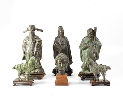 Lot 676 - Three contemporary polished metal figures of...