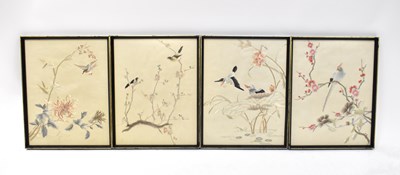 Lot 671 - A set of four Japanese silk embroidered...