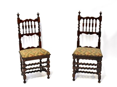 Lot 8 - A pair of 19th century fruitwood side chairs...