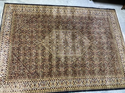 Lot 571 - A Persian rug, 346 x 244cm