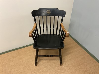 Lot 649 - An American ebonised chair with stencilled...