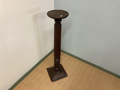 Lot 652 - Mahogany torchere, height 103cm.