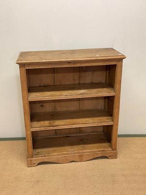 Lot 671 - A pine book case with two shelves,height 97cm,...