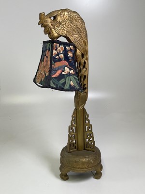 Lot 536 - A carved gilt decorative lamp, height 76cm