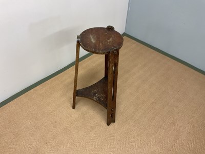 Lot 655 - An Arts and crafts plant stand, height 74 cm.