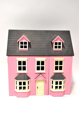 Lot 487 - A pink Georgian-style doll's house with...