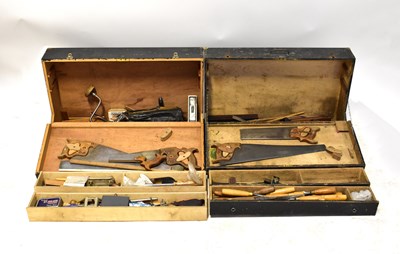 Lot 117 - Two wooden tool boxes containing an array of...