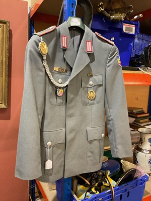 Lot 5131 - A reproduction German Army jacket, with badges...