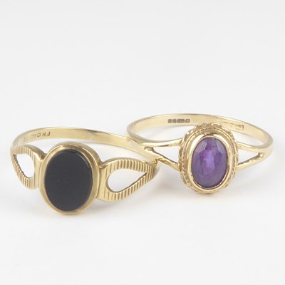 Lot 1026 - Two 9ct gold dress rings, one with bezel set...