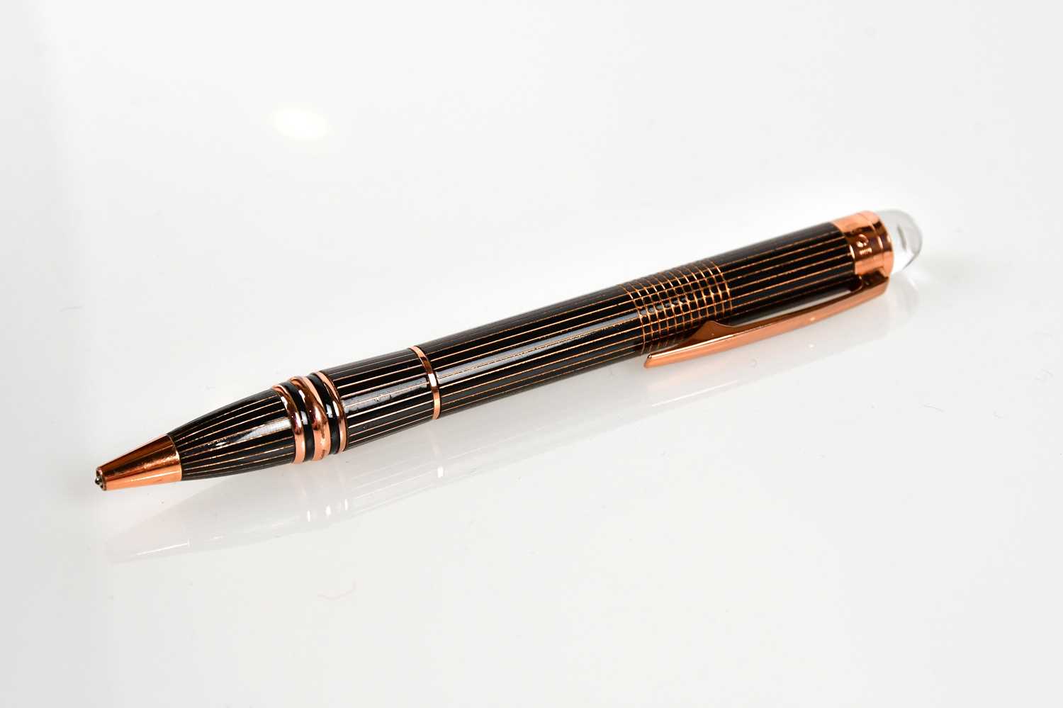 Lot 971 - MONTBLANC; a rose gold metal Starwalker...