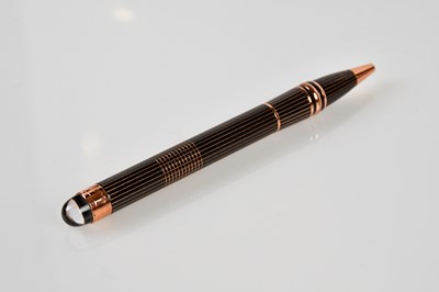 Lot 971 - MONTBLANC; a rose gold metal Starwalker...