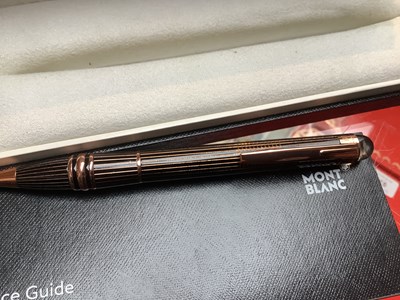 Lot 971 - MONTBLANC; a rose gold metal Starwalker...