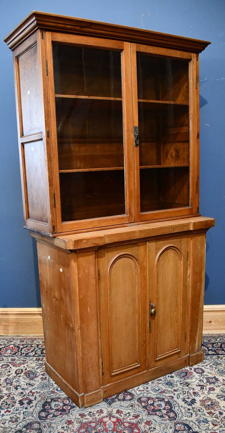 Lot 33 - A Victorian pine two door low cupoboard with...