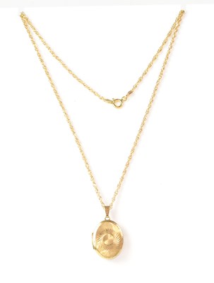 Lot 1089 - A 9ct gold fine link chain and locket, approx....