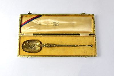 Lot 858 - A cased silver gilt replica anointing spoon,...