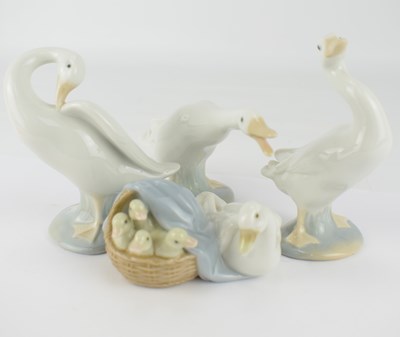 Lot 603 - LLADRÓ; four porcelain geese figures, height...