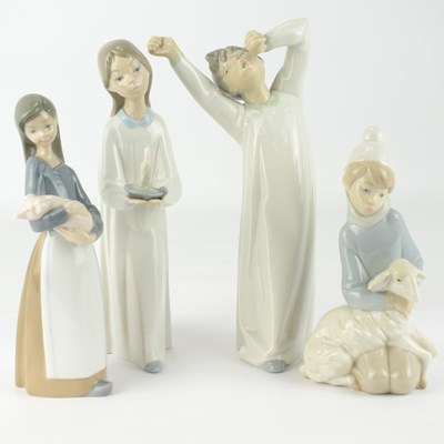 Lot 602 - LLADRÓ; four porcelain figures of children,...