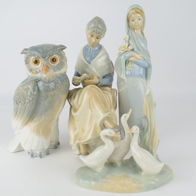 Lot 582 - Four Spanish porcelain figures, to include a...