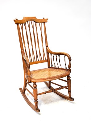 Lot 2 - A late 19th early 20th century  rocking chair
