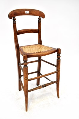 Lot 1 - A child's late 19th century tall correction chair