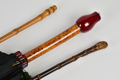 Lot 951 - A vintage 1920s black silk umbrella with...