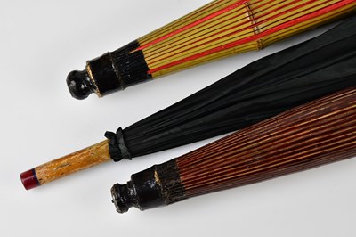 Lot 951 - A vintage 1920s black silk umbrella with...