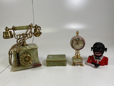 Lot 46 - An onyx clock, together with a onyx telephone,...