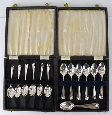 Lot 884 - Two cased sets of six hallmarked silver coffee...