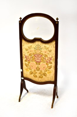 Lot 62 - A French walnut fire screen