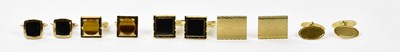 Lot 691 - A pair of 9ct yellow gold and black onyx...