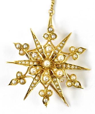 Lot 588 - A 15ct yellow gold and seed pearl star...