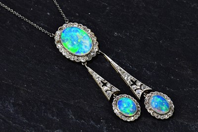 Lot 312 - An Edwardian 15ct yellow gold diamond and opal...