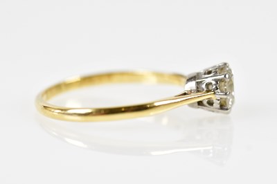 Lot 62 - An 18ct yellow gold platinum tipped diamond...