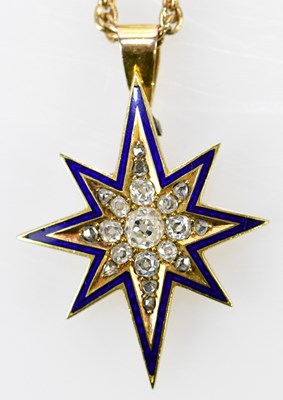 Lot 371 - A yellow metal diamond and blue enamelled star...