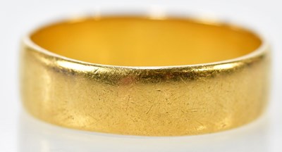 Lot 107 - An 18ct yellow gold wedding band, size Z,...