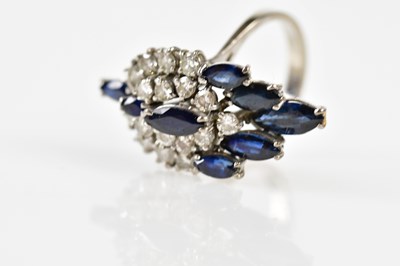 Lot 38 - An 18ct white gold sapphire and diamond...
