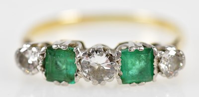 Lot 91 - A yellow metal emerald and diamond five stone...