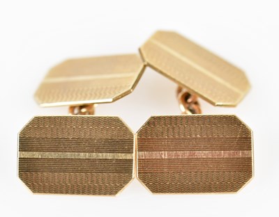 Lot 690 - A pair of 9ct gold cufflinks with twin...