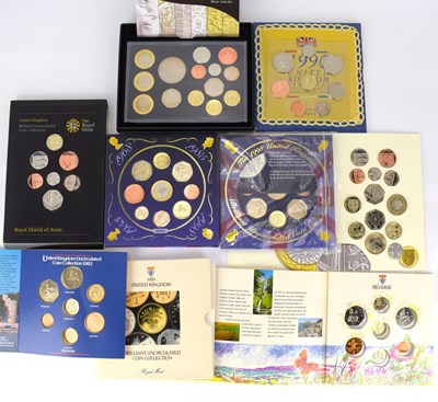 Lot 988 - ROYAL MINT; eight commemorative coin packs, to...