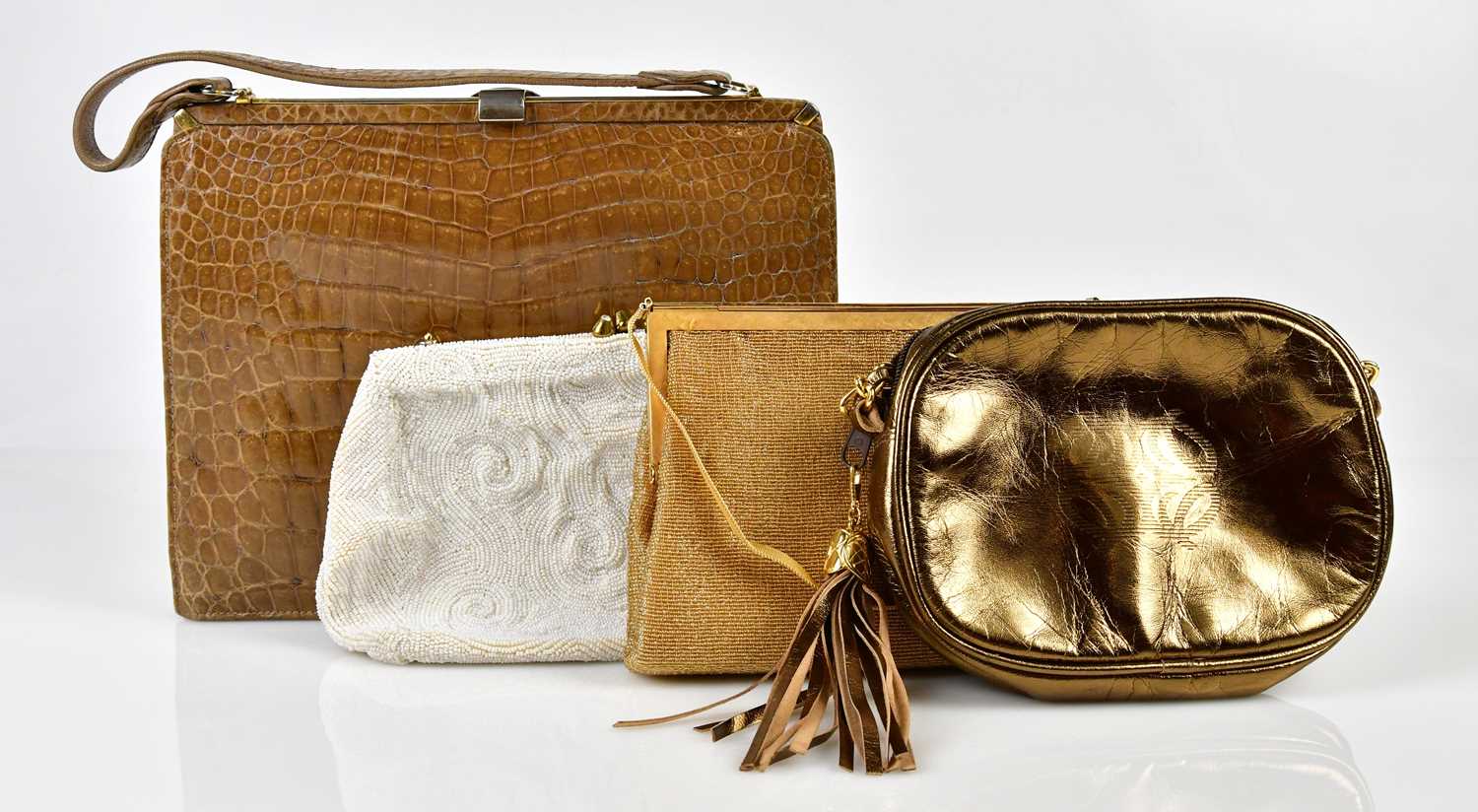 Lot 914 - A vintage pale brown crocodile handbag, a...
