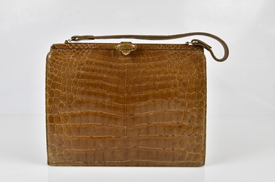 Lot 914 - A vintage pale brown crocodile handbag, a...