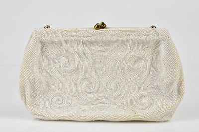 Lot 914 - A vintage pale brown crocodile handbag, a...